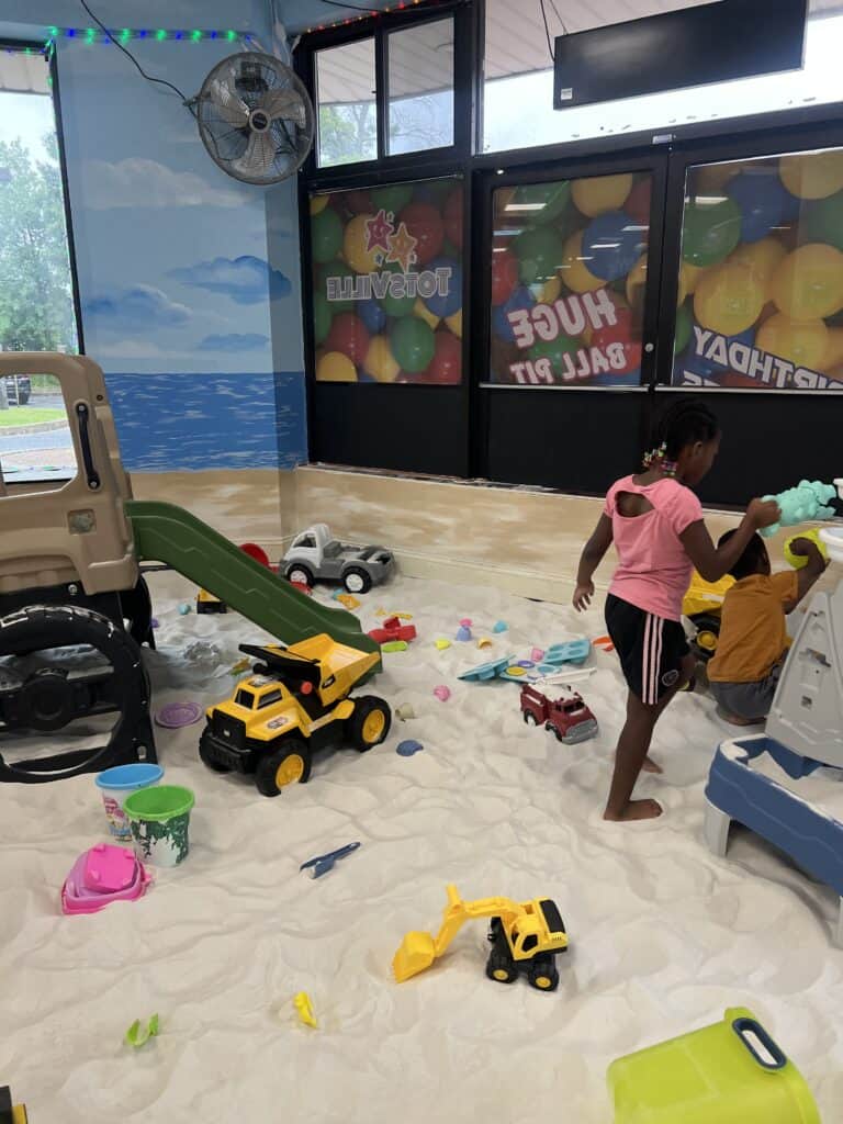 kids playing in the sandput at totsville glen burnie