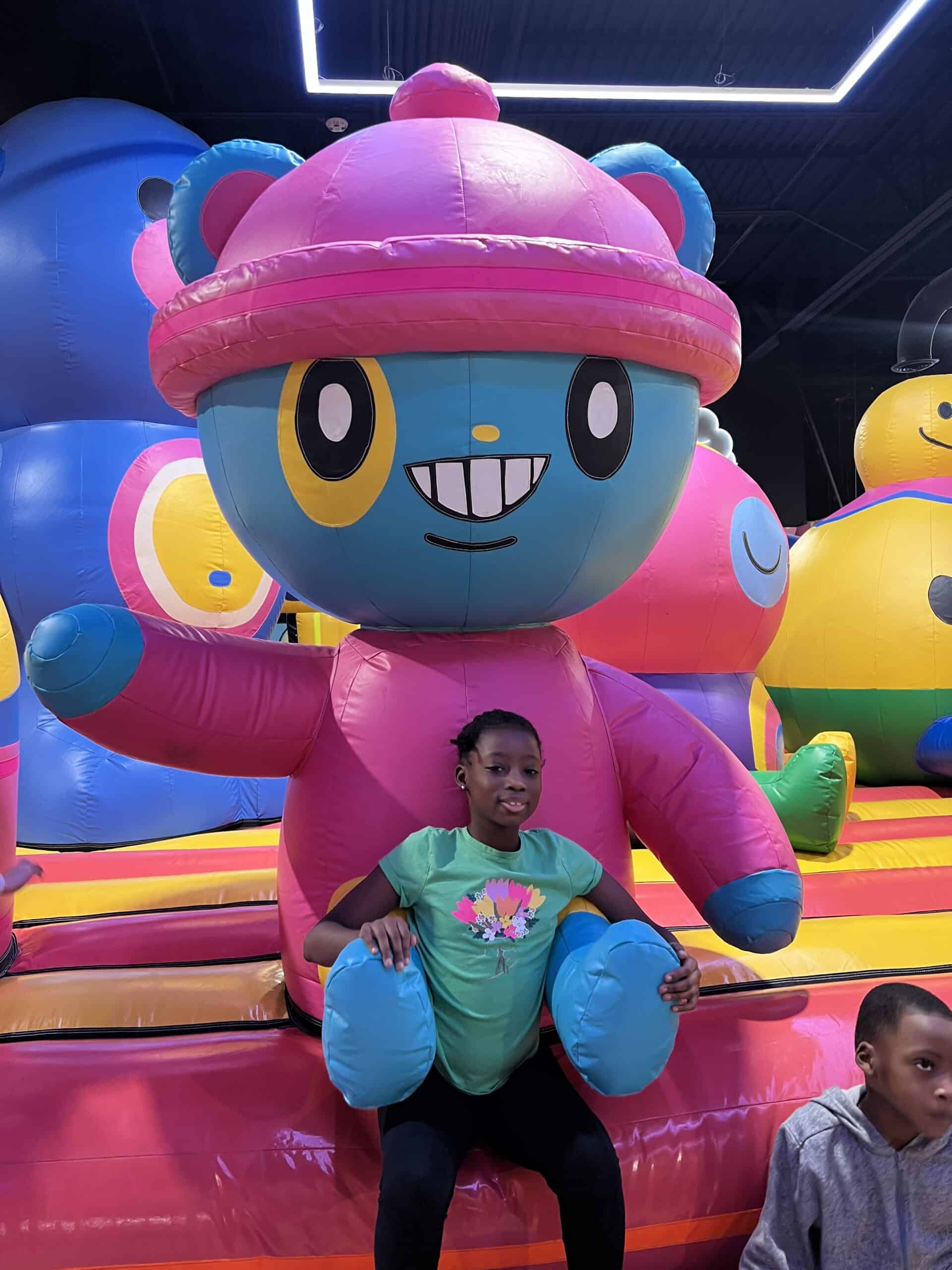 girl next to inflatable in funbox bowie